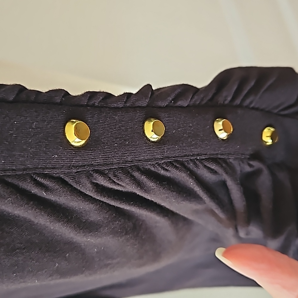 Soft, stretchy, cowl neck top with gold stud detail. Side ruching.